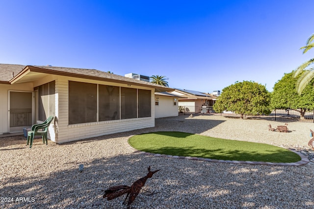 rear view of house featuring a patio area