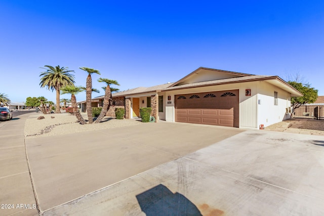 ranch-style home with a garage