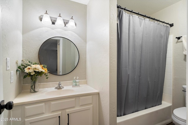 full bathroom with vanity, toilet, and shower / tub combo