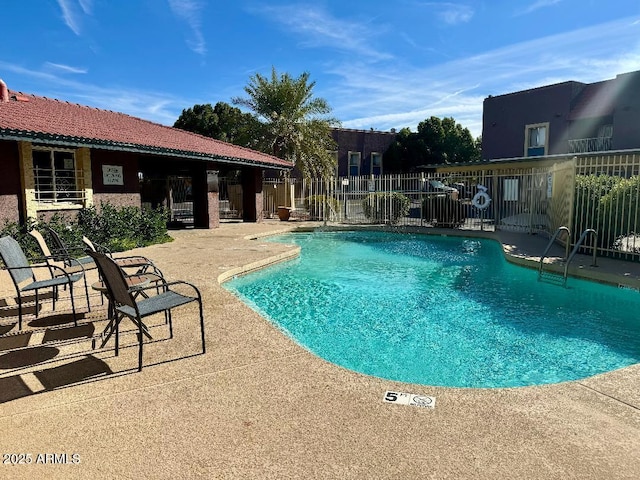 view of pool featuring a patio area