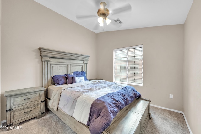 bedroom featuring ceiling fan, light colored carpet, and lofted ceiling