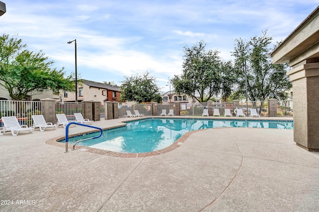 view of pool featuring a patio area