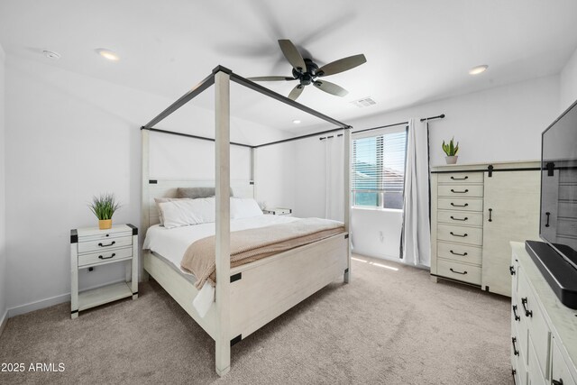 bedroom with ceiling fan, recessed lighting, visible vents, and light colored carpet