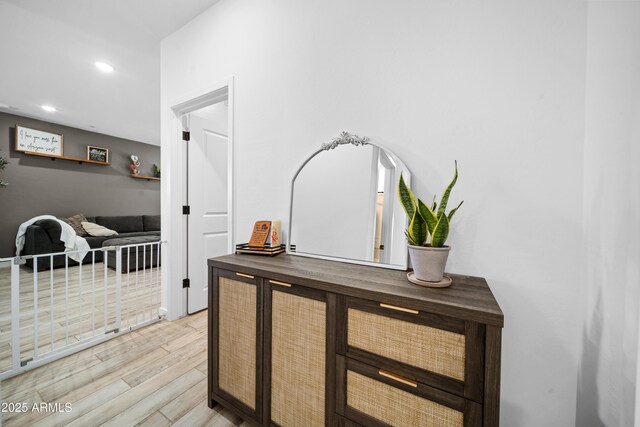 hallway featuring recessed lighting and light wood-type flooring