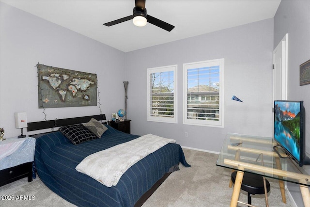 bedroom featuring a ceiling fan, baseboards, and carpet floors