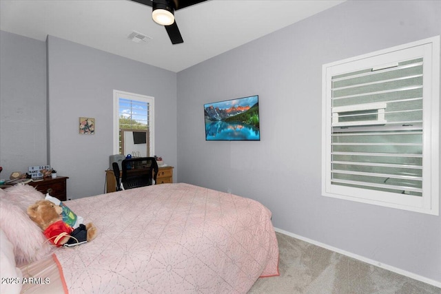 bedroom featuring visible vents, ceiling fan, baseboards, and carpet