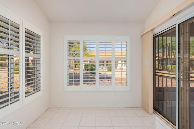 unfurnished sunroom with plenty of natural light