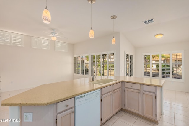 kitchen featuring light tile patterned flooring, dishwasher, pendant lighting, and sink