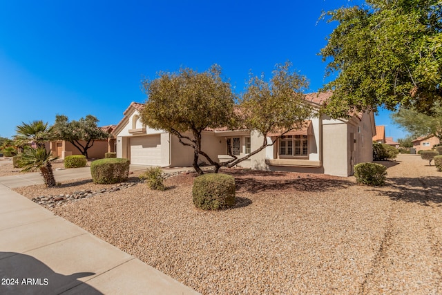 view of front of home with a garage