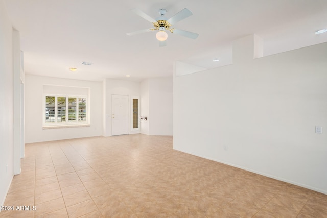 spare room featuring ceiling fan