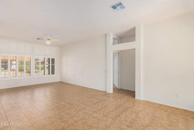 unfurnished room featuring ceiling fan