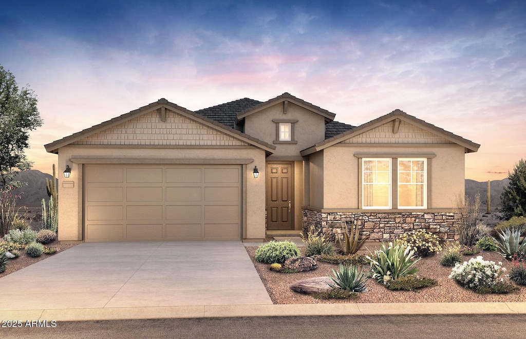 view of front of property with a garage