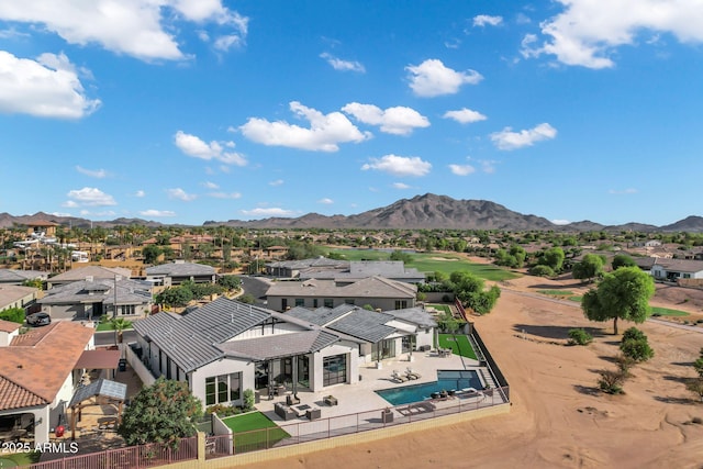 exterior space featuring a residential view and a mountain view