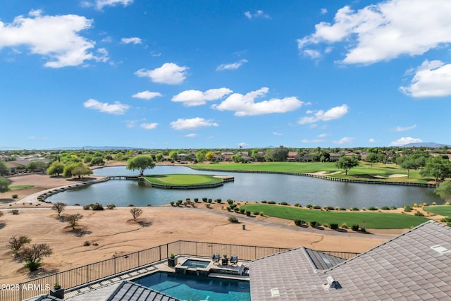 exterior space featuring a water view and golf course view