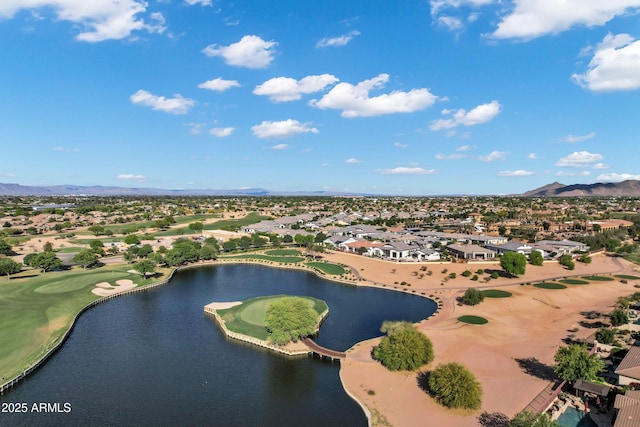 birds eye view of property featuring a residential view, a water and mountain view, and golf course view