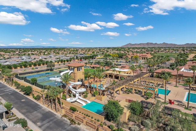 drone / aerial view with a residential view and a mountain view