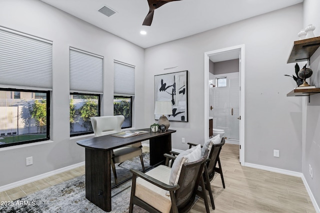 office space featuring ceiling fan, recessed lighting, baseboards, light wood-type flooring, and visible vents