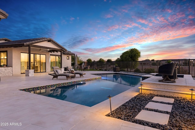 view of swimming pool with a fenced in pool, a patio area, and fence