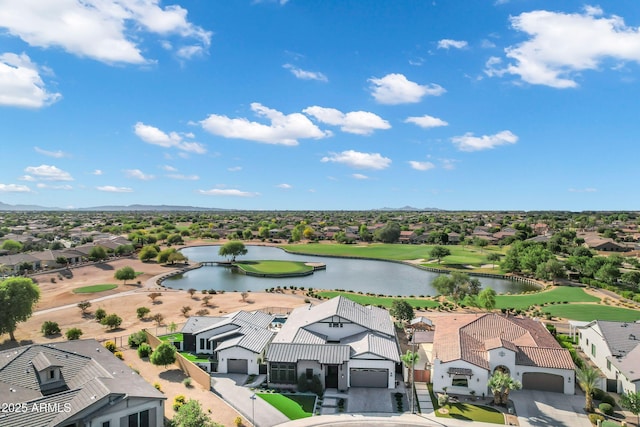 birds eye view of property featuring a water view, view of golf course, and a residential view