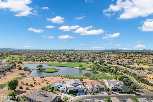 birds eye view of property featuring a residential view, view of golf course, and a water and mountain view