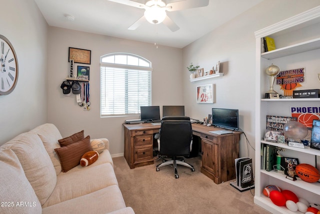 office area featuring ceiling fan and light colored carpet