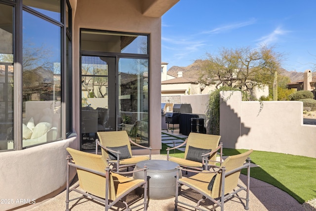 view of patio with fence