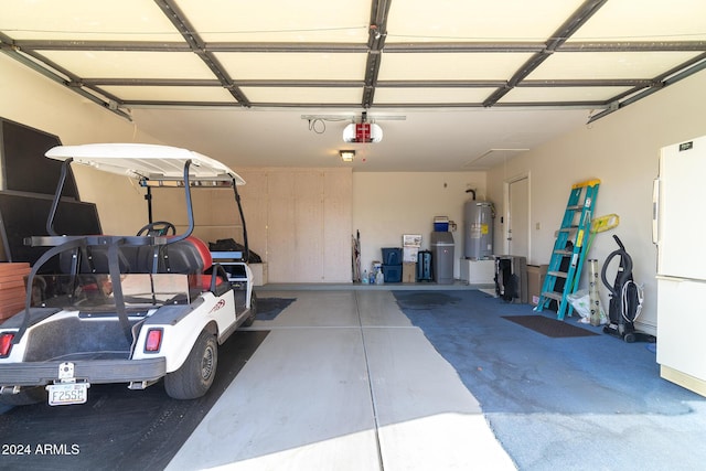 garage featuring white fridge, a garage door opener, and water heater