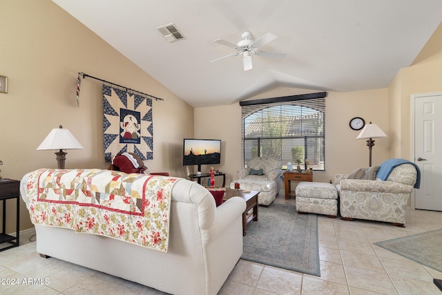 tiled living room with ceiling fan and lofted ceiling