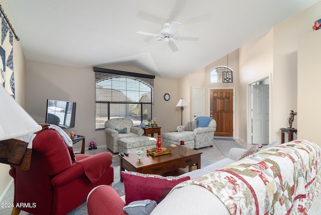 living room with light carpet, vaulted ceiling, and ceiling fan