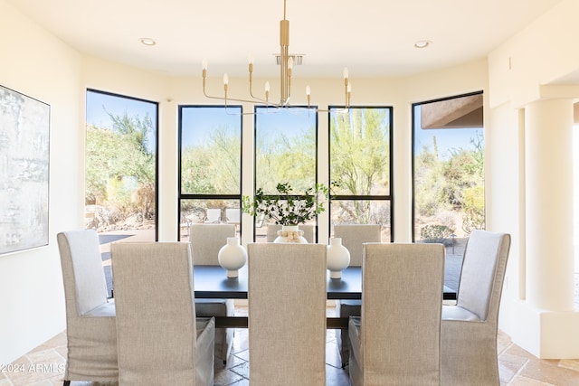 dining area with a notable chandelier