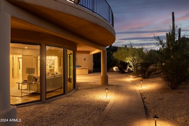 exterior space with a balcony and a patio area