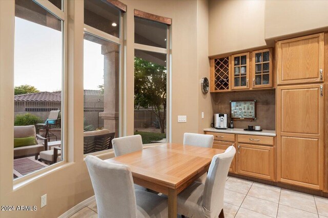 dining space with light tile patterned flooring