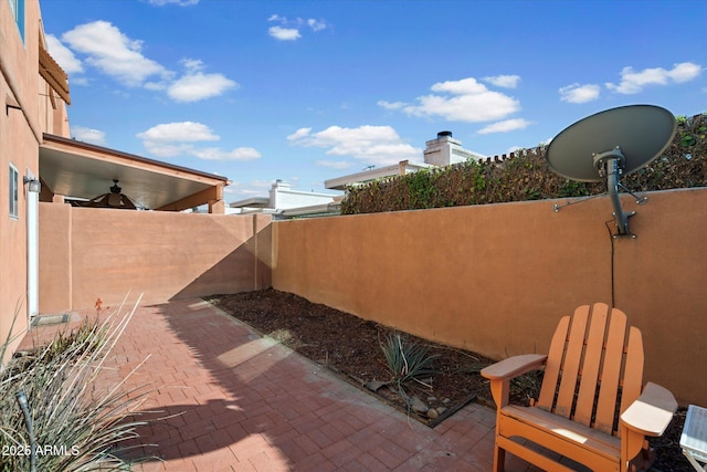 view of patio / terrace featuring ceiling fan