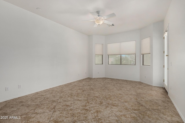 2425 W Red Range Way, Phoenix, AZ 85085 - spare room with ceiling fan and baseboards
