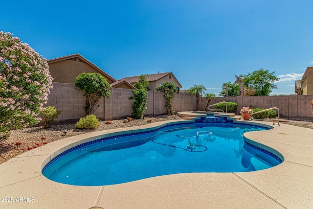 2425 W Red Range Way, Phoenix, AZ 85085 - view of swimming pool featuring a fenced backyard, a pool with connected hot tub, and a patio area