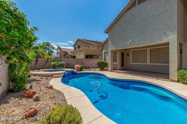 2425 W Red Range Way, Phoenix, AZ 85085 - view of pool featuring a fenced backyard, a patio, and a pool with connected hot tub