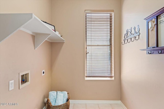 laundry area with light tile patterned flooring, washer hookup, and electric dryer hookup