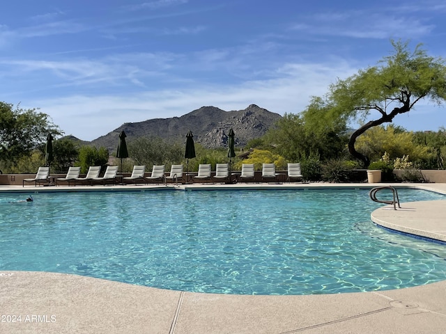 view of pool featuring a mountain view