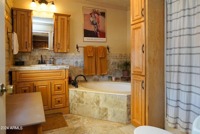 bathroom featuring vanity, tile patterned floors, ornamental molding, backsplash, and a relaxing tiled tub