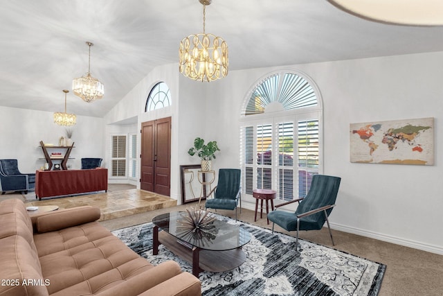 living room featuring baseboards, carpet flooring, vaulted ceiling, and an inviting chandelier