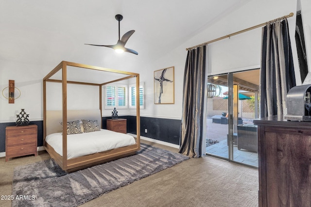 bedroom with access to exterior, a ceiling fan, carpet flooring, and vaulted ceiling