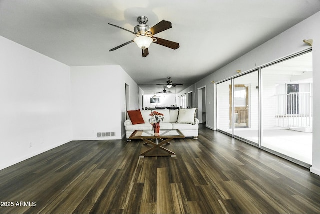 unfurnished room featuring ceiling fan and dark hardwood / wood-style flooring