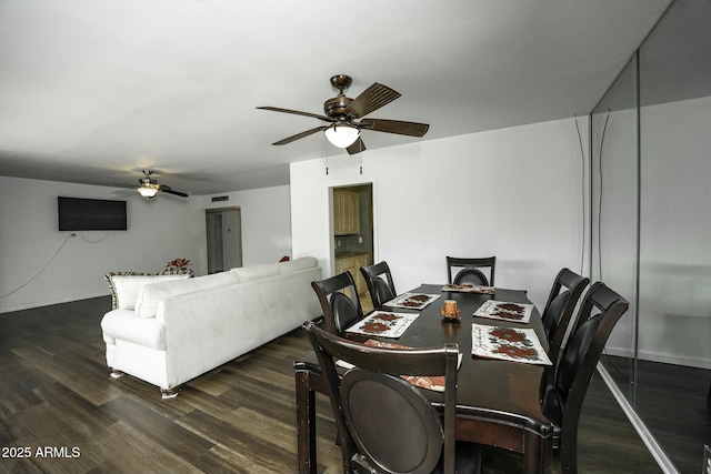 dining room featuring dark hardwood / wood-style flooring