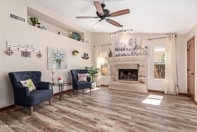 interior space featuring ceiling fan, light hardwood / wood-style flooring, and a wealth of natural light