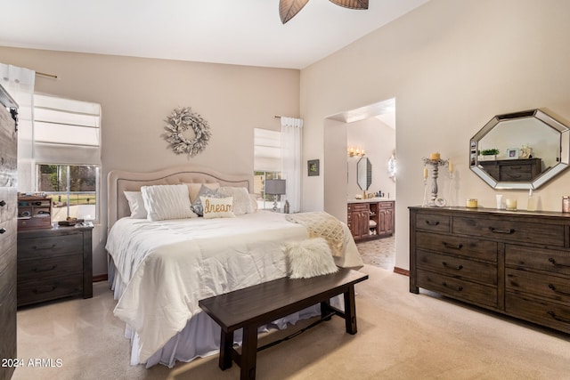 bedroom featuring light colored carpet, ceiling fan, and high vaulted ceiling