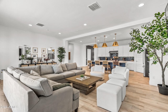 living room featuring light wood-type flooring