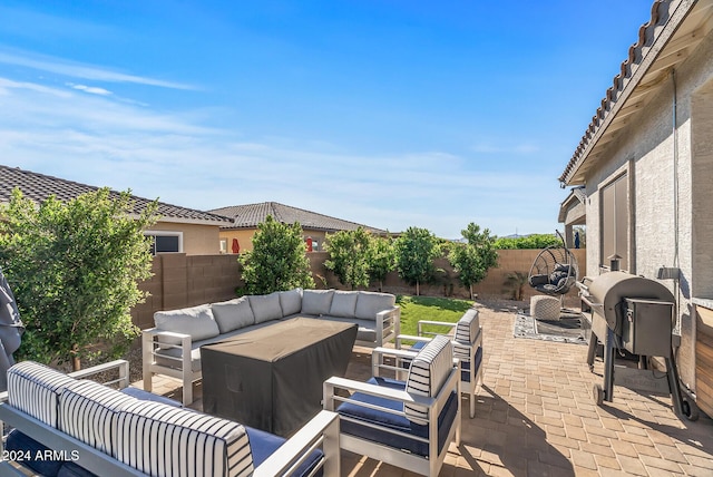 view of patio featuring outdoor lounge area and area for grilling