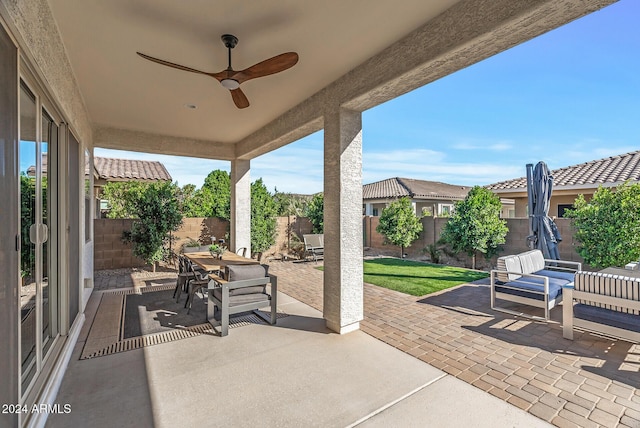 view of patio with ceiling fan