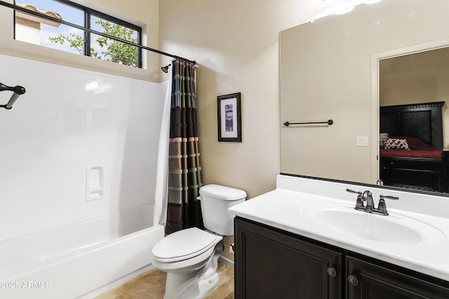 full bathroom with vanity, toilet, and shower / tub combo