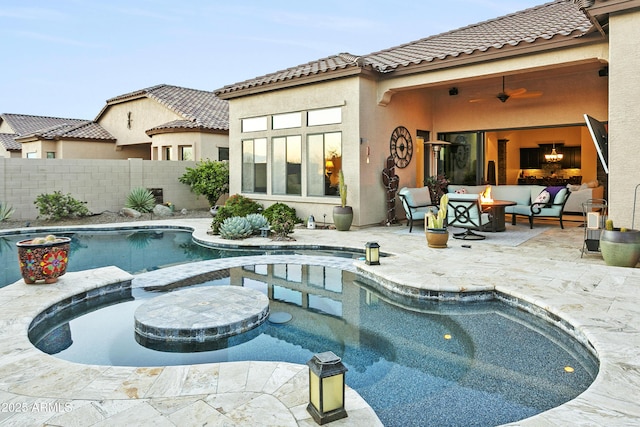 view of swimming pool featuring ceiling fan, a patio, and an outdoor hangout area